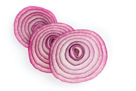 Sliced red onion on white background
