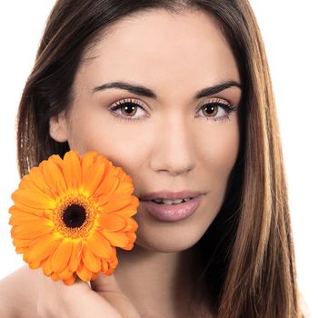 Beautiful smiling woman portrait with flower 