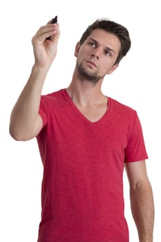 Young man with red t-shirt writing with permanent marker