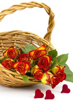 red and yellow roses in a basket