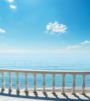 balcony near sea under blue sky