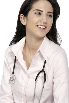 Beautiful young doctor sat smiling at her work desk