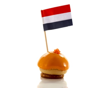 dutch orange pastry with flag in red white blue