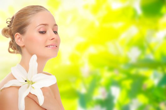 Young girl with flower on spring floral background