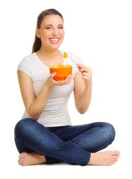 Young woman with fruit salad isolated