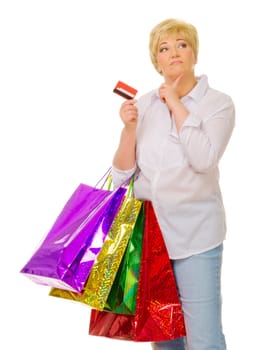 Senior woman with bags and credit card isolated