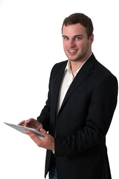 Young Businessman in jeans working on a tablet pc