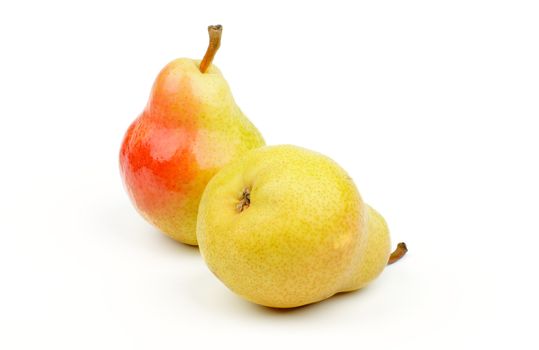 Two Perfect Ripe Red and Yellow Pears isolated on white background