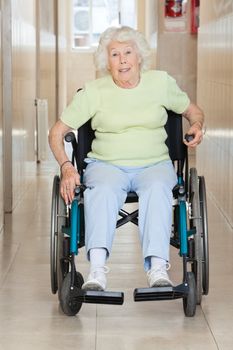 Full length portrait of a senior woman sitting in a wheel chair
