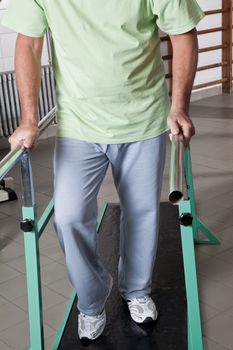 Portrait of Senior man having ambulatory therapy.