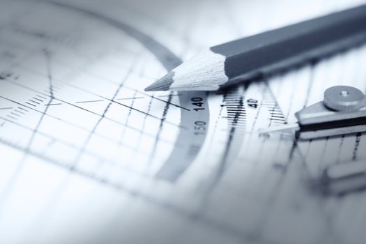 Scheme with compasses rulers and pencil. Monochrome photo