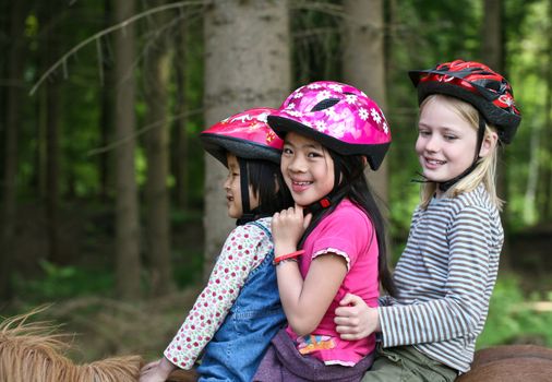 Girls on horse in a forest in denmark