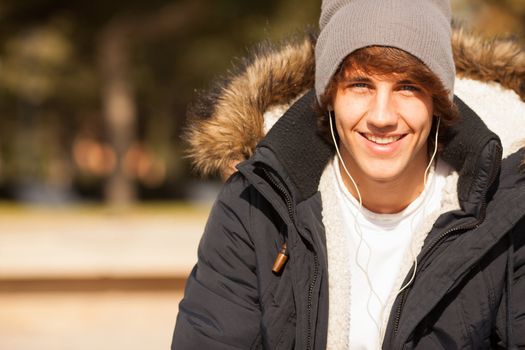 young handsome man portrait with headphones