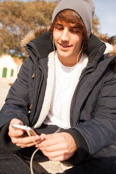 young handsome man portrait with headphones