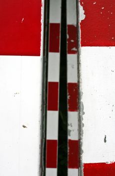 detail of a handball goal with red and white stripes