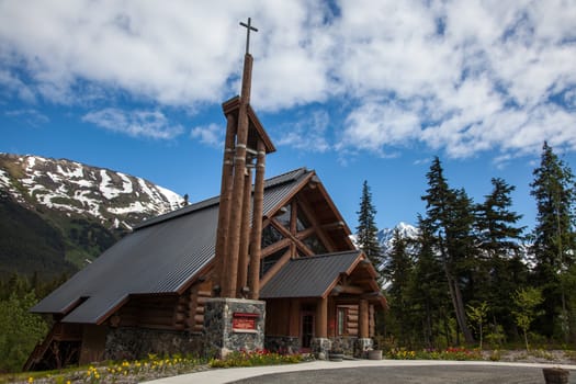 A log construction church sits in a remote Alaska town