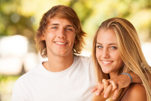 young beautiful couple enjoying a day on the park on summer