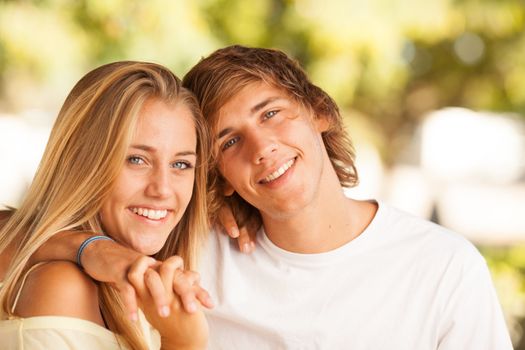 young beautiful couple enjoying a day on the park on summer