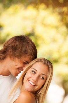 young beautiful couple enjoying a day on the park on summer