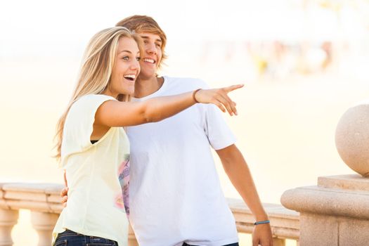 young beautiful couple enjoying a day on the park on sunny day