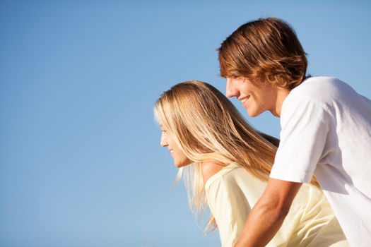 young beautiful couple enjoying a summer day together