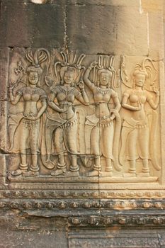 Wall bas-relief of Devatas, Angkor Wat temple, Siem Reap, Cambodia