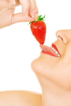 Young girl eat strawberry isolated