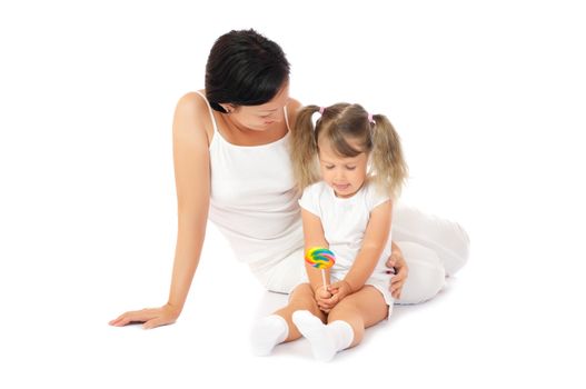 Little smiling girl with mother isolated