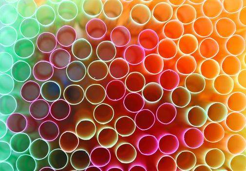 Close up picture of many colorful straws