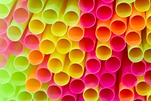 Close up picture of many colorful straws