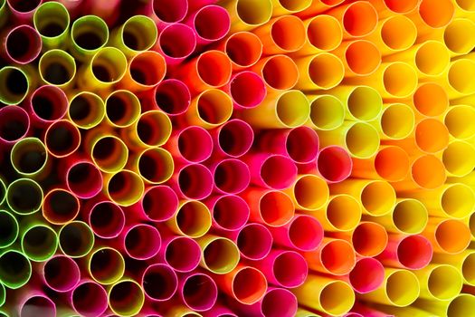 Close up picture of many colorful straws