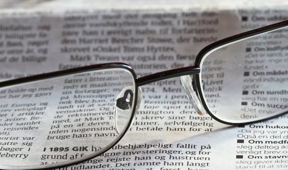 Pair of glasses tanding on a table