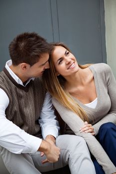 Loving young couple sitting leisurely