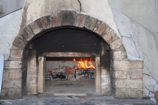 wood fired brick bread and pizza oven warming for baking