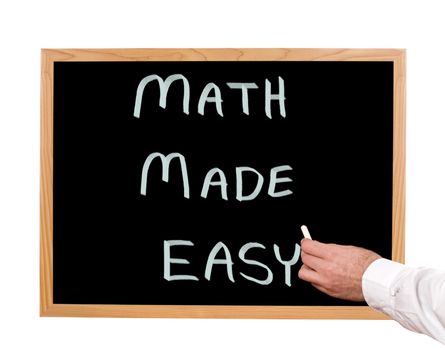 Math made easy is written in chalk on a chalkboard.
