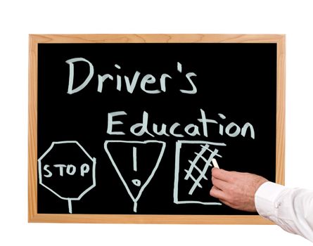 Driver's education is written in chalk on a chalkboard.