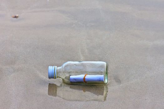 glass bottle on the beach 