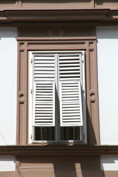 Old window with shutters in Graz, Austria, Europe.