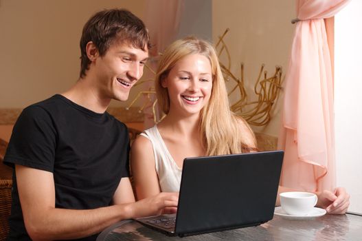 Young couple with laptop