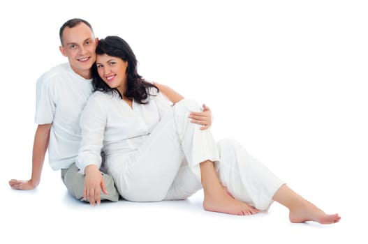 Young smiling couple isolated on white