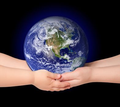 Child and woman holds earth globe on black