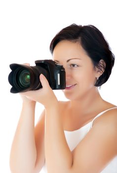 Young woman with DSLR isolated
