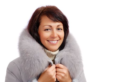 Closeup portrait of young woman in fluffy hood