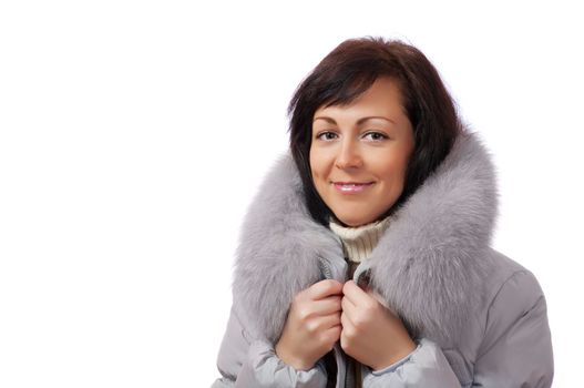 Closeup portrait of young woman in fluffy hood