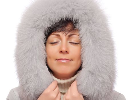 Closeup portrait of young woman in fluffy hood