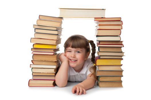 Little smiling girl with books isolated