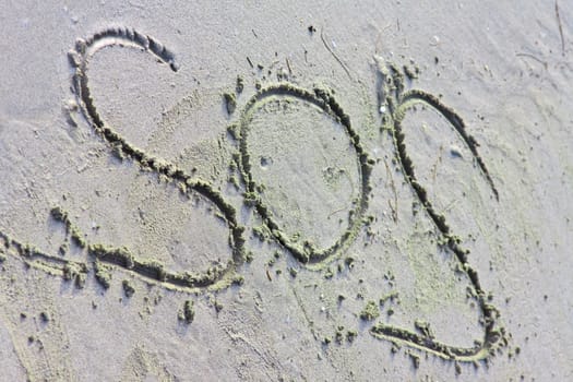 The inscription on the sand