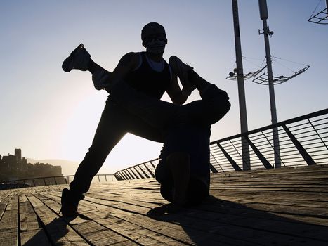 Silhouettes of poses of two rappers