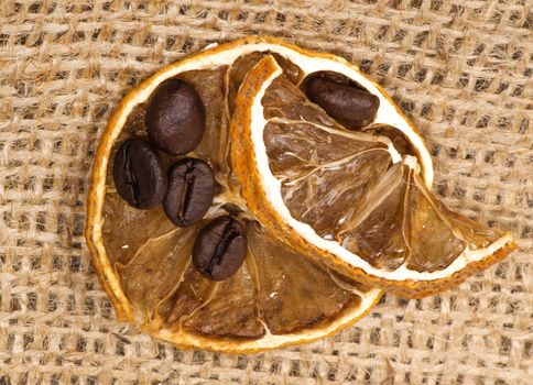 lemons and coffee beans on burlap