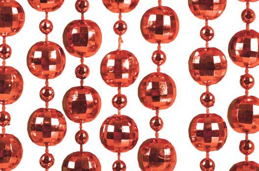Background made of a brilliant celebratory beads of red color
